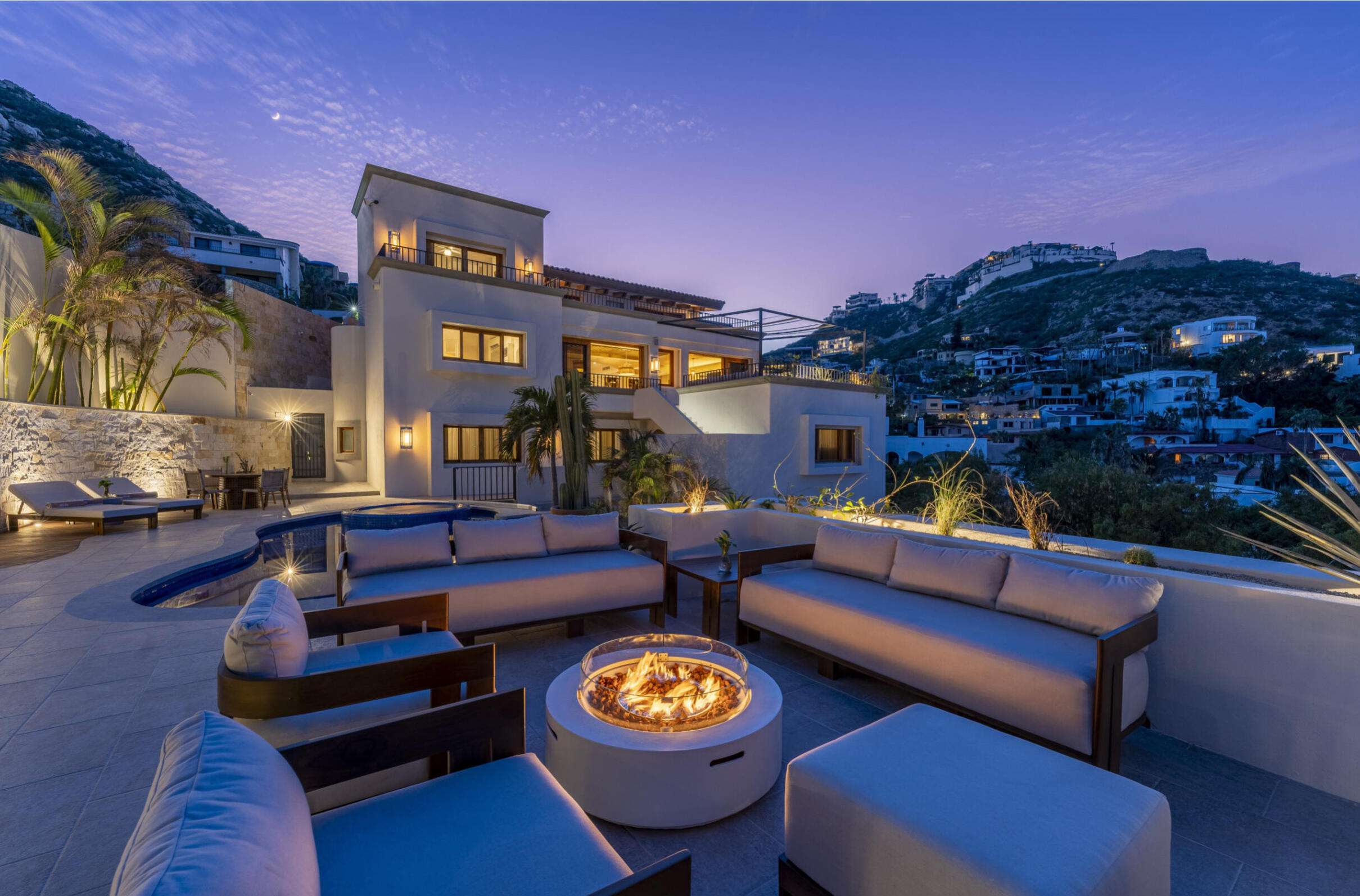 Cabo Luxury Pedregal Csl Casa LA PIÑATA A luxury villa located in the exclusive Pedregal Cabo San Lucas. Perfect as a private residence or a high-end vacation rental, this villa offers an exceptional combination of comfort, style, privacy, and location.The villa features 8 bedrooms including a service room (as an independent apartment suite), 8.5 bathrooms, and 13 beds.Fully furnished and equipped with top-quality finishes, providing a turnkey experience.Every detail has been thoughtfully crafted to create an exceptional space for family gatherings and entertaining. The expansive terrace includes a great swimming pool, 2 jacuzzi, bar, 2 BBQ station, 2 fire pits, and multiple lounge areas, to enjoy the very best of Cabo living The interiors feature cozy and elegant living spaces, including a inside bar, games room, media room and impeccable design in every corner Fully furnished and equipped, representing an outstanding opportunity. With its exceptional design, amenities, and location, this villa embodies the best of the Baja lifestyle for sale