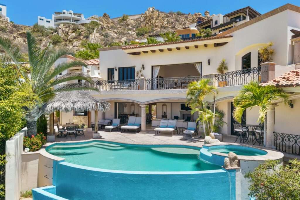 Cabo Luxury Section 4- Las Canadas Discover refined indoor-outdoor living at Cañada 9, set within Querencia, San Jose del Cabo's premier private golf community. Soaring beamed ceilings, walls of pocket glass, and luminous marble floors define an open great room that flows effortlessly to the terrace, infinity-edge pool, and stone-clad water feature -- all framed by panoramic Sea of Cortez and mountain – 140 Camino Pacifico Alto, Cabo San Lucas, BS