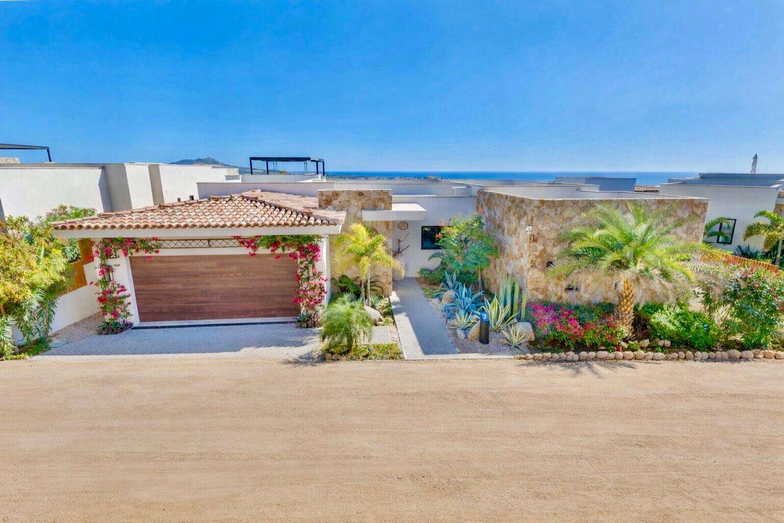 Cabo Luxury Las Terrazas Set along the 15th hole of the El Cardonal Golf Course, panoramic vistas extend from rolling fairways to the Pacific, delivering striking sunrises and sunsets.This four-bedroom, 4.5-bath home blends refined design with seamless indoor-outdoor living. Open-concept interiors feature Palecek furnishings, while each bathroom showcases hand-painted Mexican tile for warmth and authenticity.Outdoor living includes a private pool and elevated hot tub, outdoor grill and wet bar, lush landscaping, and expansive terraces with golf course and ocean for sale