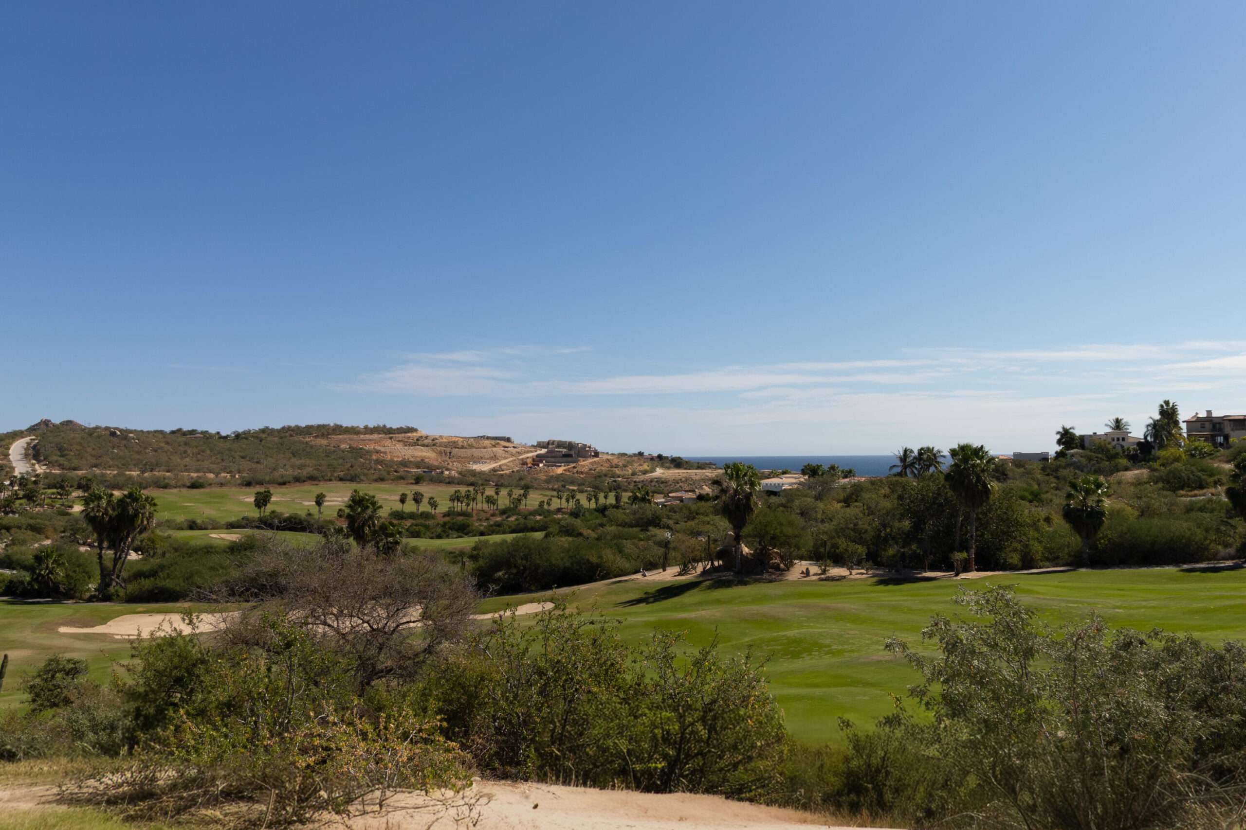 Cabo Luxury Golf Villas Set along the lush Bermuda fairways of the Tiger Woods-designed Oasis Short Course, this exceptional five-bedroom hacienda-style residence blends classic Mexican architecture with refined contemporary luxury. A grand central courtyard opens to an expansive great room that flows seamlessly to a private terrace with heated pool, palapa swim-up bar, and fire-pit lounge overlooking the Oasis par-three course. Designed for effortless entertaining, the home features multiple indoor and outdoor living spaces, a gourmet kitchen, and a covered outdoor grill ideal for hosting family and friends. As a Legacy Club home at Diamante Cabo San Lucas, ownership provides access to championship golf, the iconic Crystal Lagoon®, spa, beach club dining, and miles of Pacific coastline. for sale