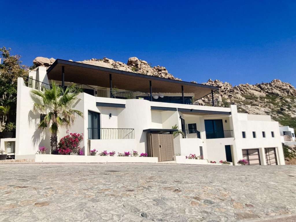 Cabo Luxury Coronado The Luna 5 bed home plan. The floor plan boasts a great room with vaulted ceilings over the living/dining area which looks out over the large covered terrace and the hand-made infinity edge pool beyond. The chefs kitchen with huge island with seating boasts Wolf and Sub-Zero appliances. The master and guest master have large ensuite baths w/ shower and tubs, and also both have ocean for sale