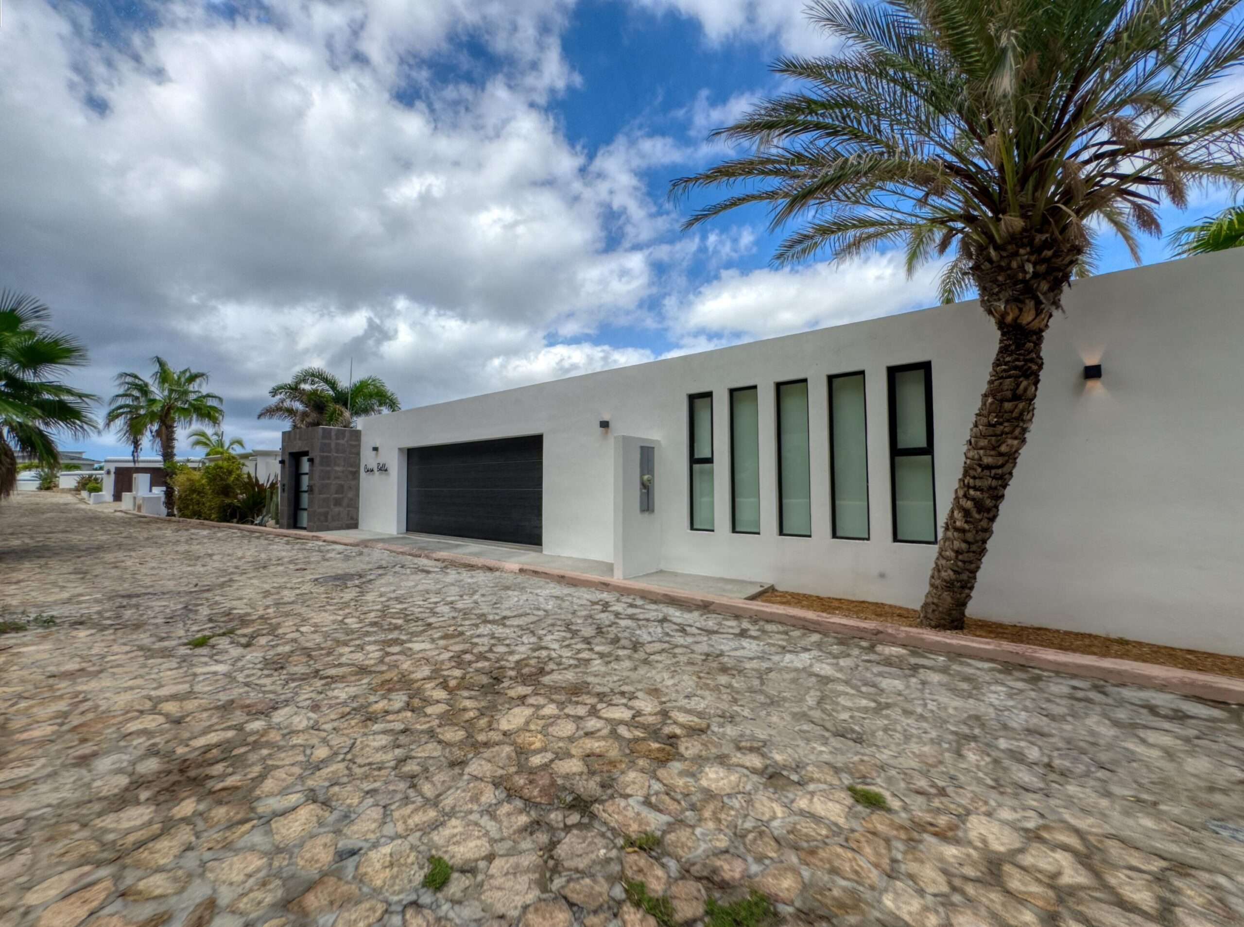 Cabo Luxury Pedregal Csl Casa Bella redesigned encompasses a warm modern style combined with abundant lush landscaping.Situated on a large private corner lot with unobstructed oceans for sale