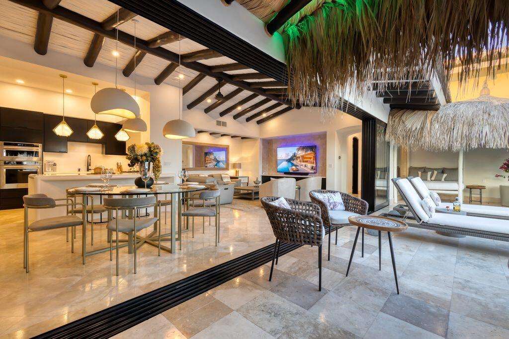 Cabo Luxury Playa Del Rey HUGE PROFT OPPORTUNITY to own the former cabo oasis of the red hot chili peppers (WATCH THE NEW NETFLIX DOC HERE cope and paste-(https://www.youtube.com/watch?v=Exs7-tOaQQY)---above a swimming/snorkel beach, currently generating a steady consistent income that outperforms others, due the former red hot chili pepper history and art. Hidden inside the double gated waterfront enclave above a a spanning beach and ocean cove, this aptly named estate awaits-just minutes to a long list of spoils. Covering nearly 6000 square feet, this triple-height foyer, opens into a grand spanning living and dining space layered in natural stone, marble and musical art throughout. Additional add-ons include: St Tropez themed exterior spaces, rooftop lounge, fire bowls and fire pits, added steam sauna and mor for sale