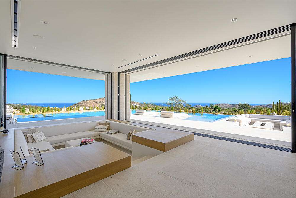 Cabo Luxury Beach Estates Luz de Diamante is perfectly situated just a short walk from the beach and nestled within the prestigious Diamante community positioned between the 5th and 16th holes of the Dunes Course designed by Davis Love III. Spanning approximately 20,000 sqft, this magnificent residence, built in 2017, seamlessly blends modern design with Mexican accents. The estate boasts four spacious master bedrooms, each providing stunning ocean for sale