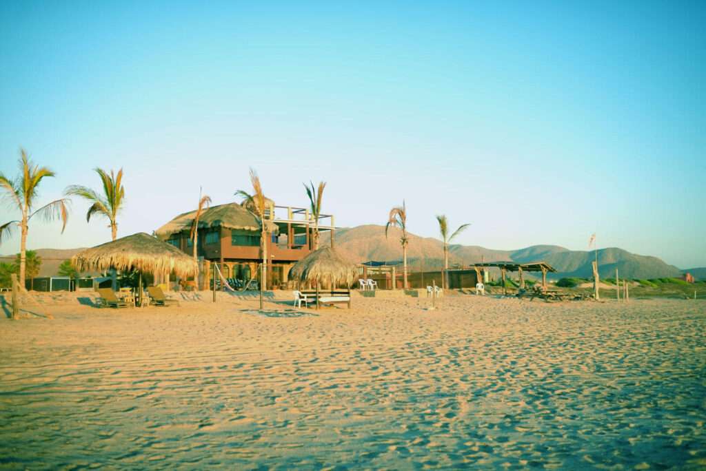 Cabo Luxury Cerritos For sale: A remarkable property in South Cerritos Beach. Spanning an impressive 3,470 m2, this lot includes two buildings with eight units, each adorned with traditional palapa roofs. The owner has meticulously prepared and enhanced the land, creating a level and expansive area extending towards the beachfront. This unique offering presents limitless potential, suitable for a family compound. The property is entirely self-sustaining, equipped with solar panels, water cistern, and septic systems, ensuring a harmonious blend with its natural surroundings. Located just 1.5 miles from the main surf break and in close proximity to local restaurants, this is an exceptional opportunity for those seeking a blend of tranquility and accessibility. – South Cerritos, Pacific, BS