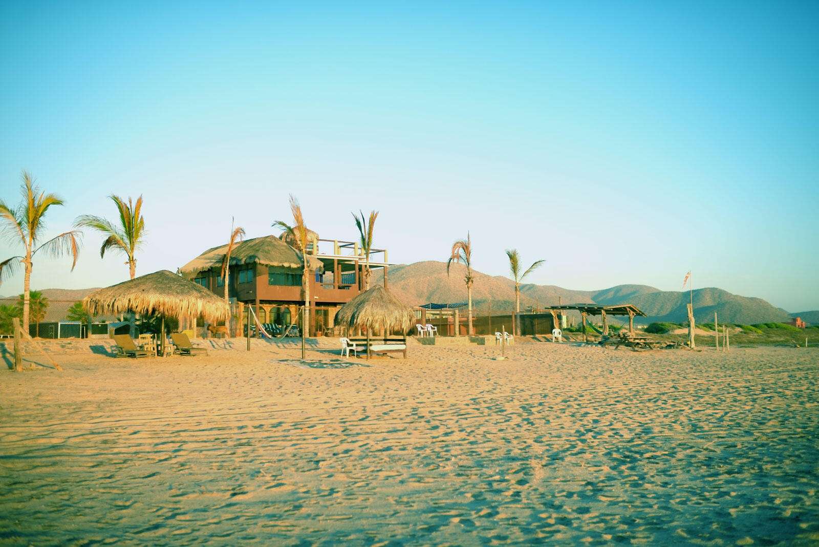 Cabo Luxury Cerritos For sale: A remarkable property in South Cerritos Beach. Spanning an impressive 3,470 m2, this lot includes two buildings with eight units, each adorned with traditional palapa roofs. The owner has meticulously prepared and enhanced the land, creating a level and expansive area extending towards the beachfront. This unique offering presents limitless potential, suitable for a family compound. The property is entirely self-sustaining, equipped with solar panels, water cistern, and septic systems, ensuring a harmonious blend with its natural surroundings. Located just 1.5 miles from the main surf break and in close proximity to local restaurants, this is an exceptional opportunity for those seeking a blend of tranquility and accessibility. for sale