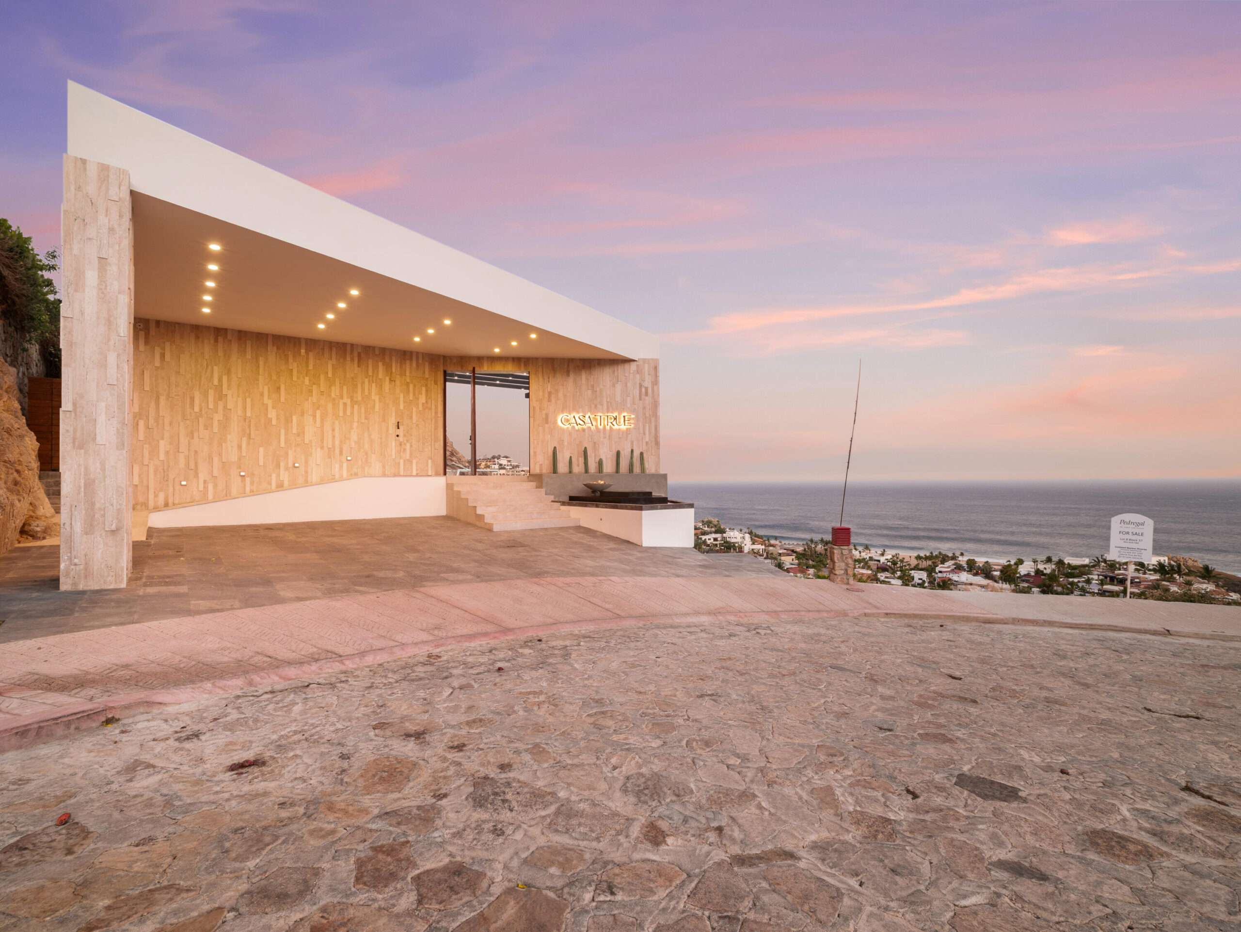 Cabo Luxury Pedregal Csl Where the Pacific Becomes Your BackyardSome homes simply house you. This one transforms you.Perched in the coveted enclave of Pedregal -- Cabo San Lucas's most prestigious address -- this five-bedroom, six-and-a-half-bathroom estate is not just a property. It's a declaration. A fully furnished masterpiece where every room was designed with a single purpose: to make you feel like the most important person in the world, because here, you are.Step inside and the ocean doesn't just greet you -- it commands the room. A sweeping open-frame window turns the Sea of Cortez into living art, framed by handcrafted parota wood furniture that brings warmth, soul, and a sense of timeless Mexican craftsmanship to every gathering. Sunsets here aren't something you watch. They're something you host. The smart bedrooms offer panoramic ocean – L12 M337 Desnudos Camino del Sol Y, Cabo San Lucas, BS