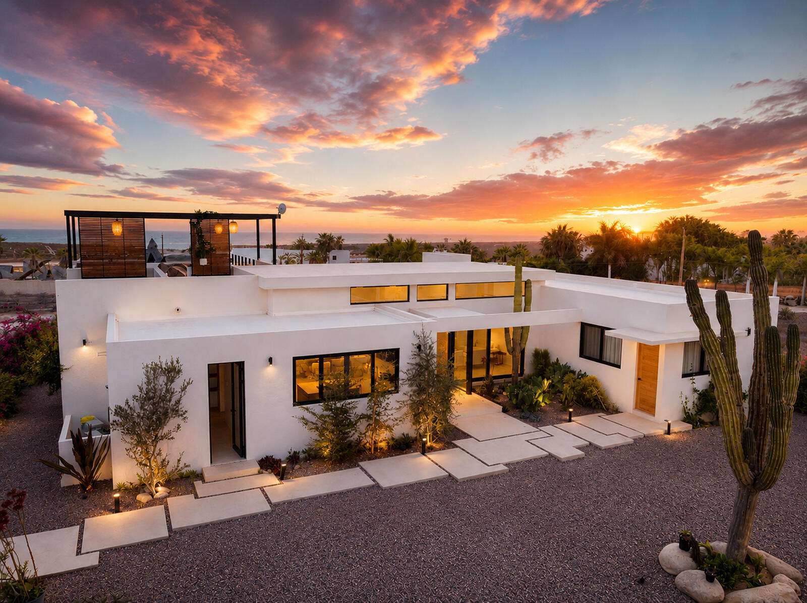 Cabo Luxury Las Tunas Ananda del Mar is a refined luxury residence crafted to exceed the expectations of even the most discerning buyer. Nestled on a private 3,000 m² (0.73-acre) lot, it is just a short stroll from the pristine sandy beaches of Las Tunas, where breathtaking sunsets and a peaceful coastal lifestyle await. The home features a thoughtful floor plan with 3 spacious bedrooms, a separate studio, a cozy TV lounge, and 6 full bathrooms, including two primary suites, a guest bedroom, a detached studio, and a dedicated media/family room. Expansive sliding glass doors fill the interiors with natural light while framing tranquil garden – 128 Mision San Diego, San Jose del Cabo, BS